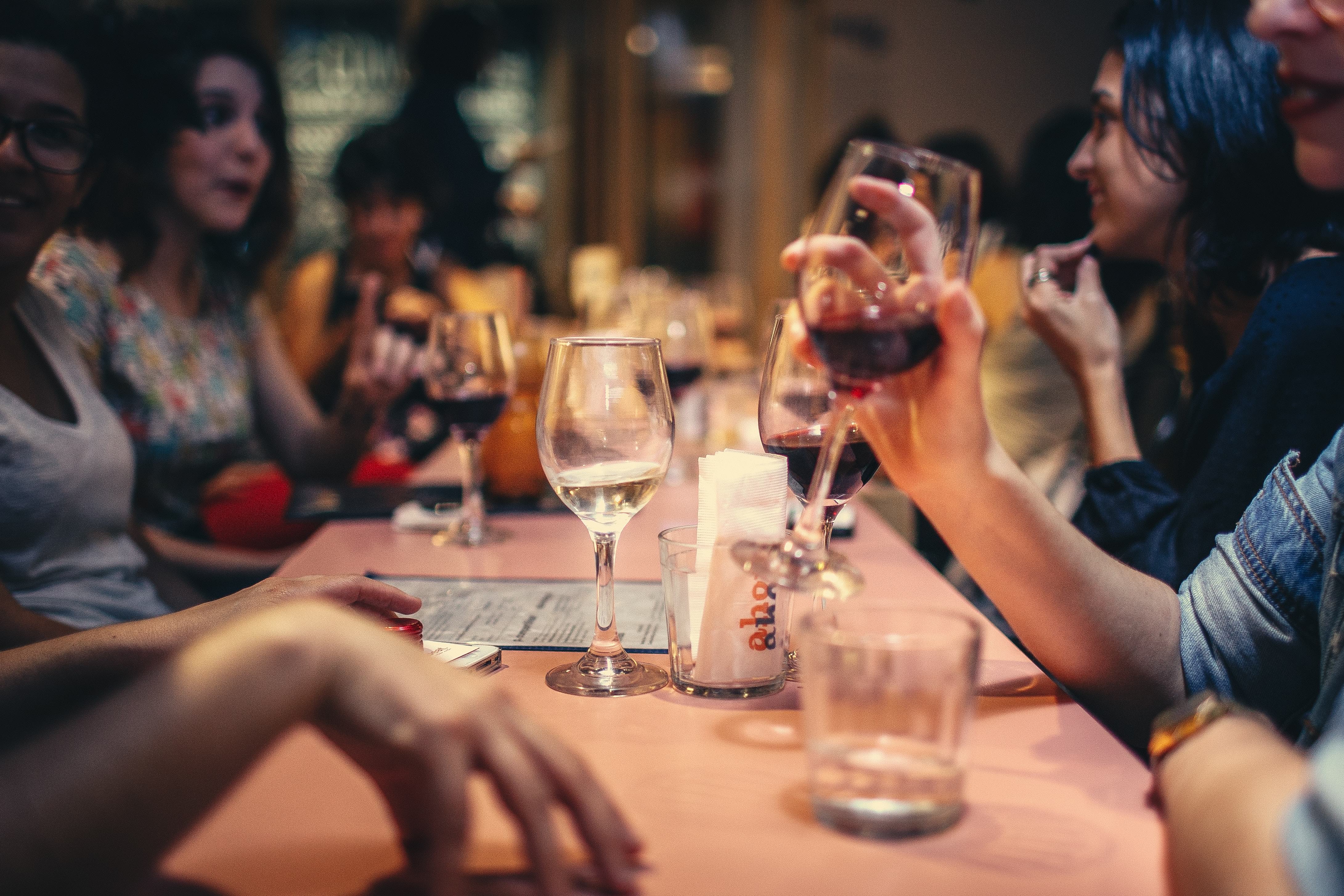WPI_wsi-imageoptim-people-drinking-liquor-and-talking-on-dining-table-close-up-696218.jpg